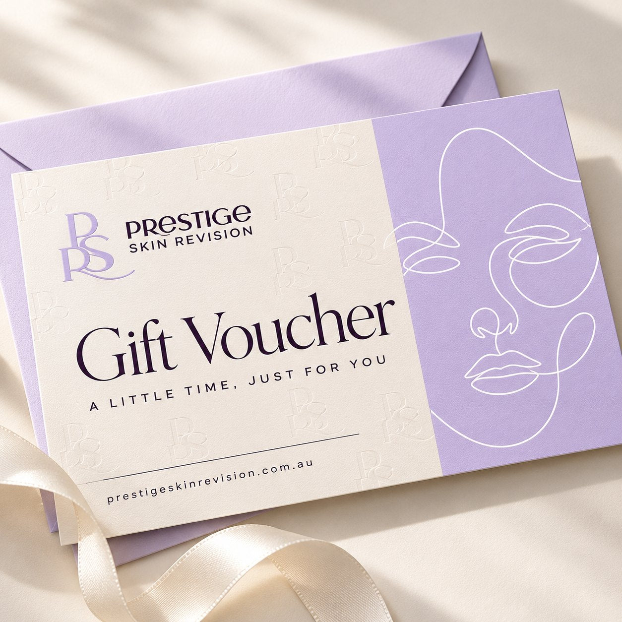 Prestige Skin Revision gift voucher card with a lilac envelope and ribbon